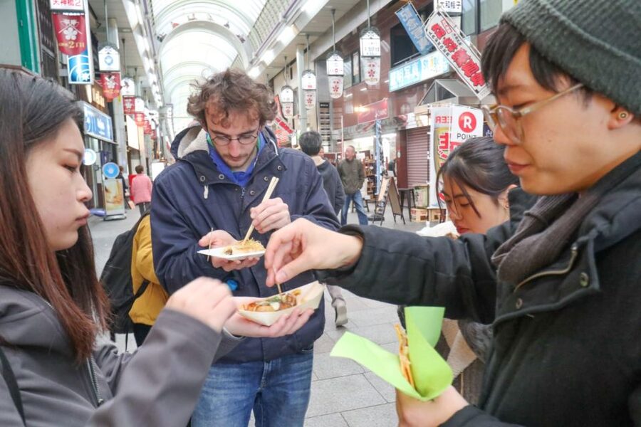 5-Hour Osaka Highlights Bike Tour with Lunch - Riverside riding and the changing city