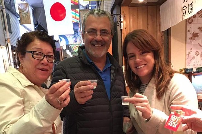 Absolute Osaka Food Tour - Starting beneath the Glico runner in Dotonbori