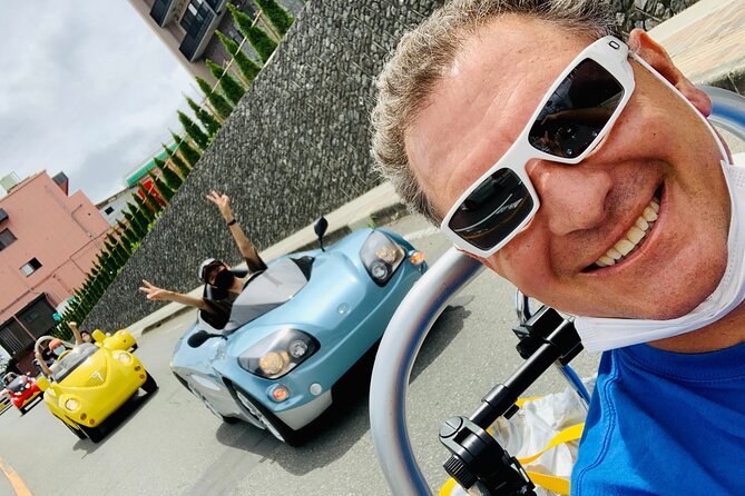 Cute & Fun E-Car tour following guide around Lake Kawaguchiko - A shrine, quiet neighborhood, and local scenery