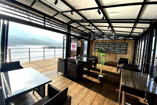 Dinner Cruise on HANAIKADA (Raft-Type Boat) with Scenic View of Miyajima - Miyajima, the torii gate, and oyster rafts from the water