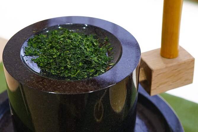 Dynamic Tokyo: Tokyo Tower, Tea Experience, Bay Cruise Day Tour - Making matcha in a garden setting