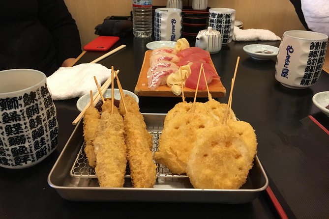 Eat, Drink & Cycle: Osaka Foodie Bike Tour - Shitennoji gives the ride a pause