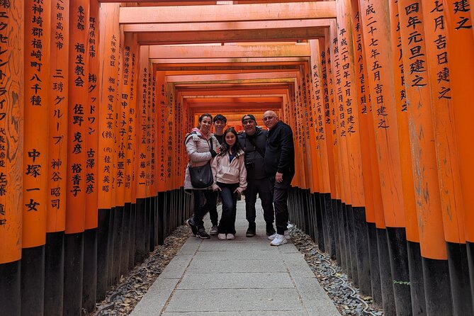 Full day Kyoto Walk in Fushimi, Arashiyama, Monkey, and Kinkakuji - Crossing Togetsukyo Bridge