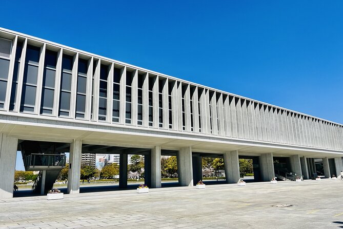 Hiroshima Walking Tour Why A Bomb was dropped to Hiroshima - A pause near Hiroshima Green Arena