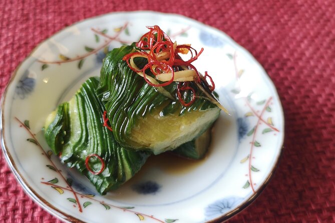 Home style Ramen and Homemade Gyoza in Kyoto - Cucumber pickles and the finished meal