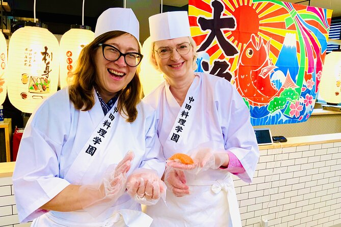 Kanazawa: Sushi & Japanese Cooking Class at a Historic School - Chef Seiji Nakata and the live translation screen