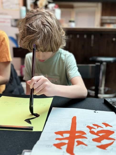 Kyoto: Japanese Calligraphy Workshop - Finishing the artwork on rice paper