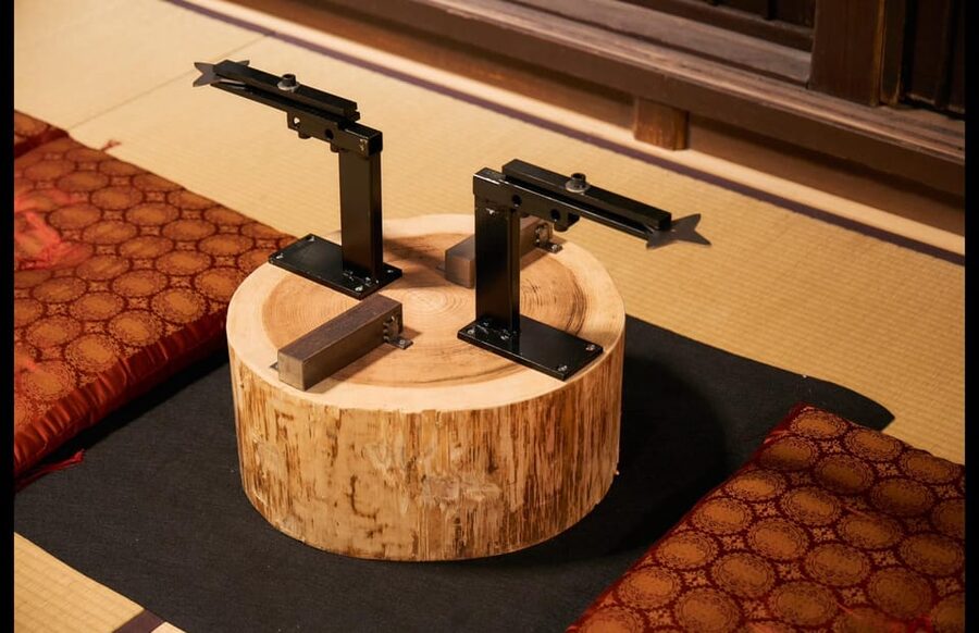 Kyoto: Ninja Weapon Forging Experience - Using the belt sander to sharpen the form