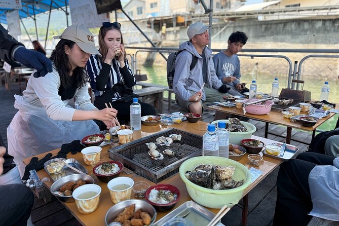 Miyajima Guided Tour and Fresh Oyster Farm Tour - Cruising toward the Great Torii and oyster rafts