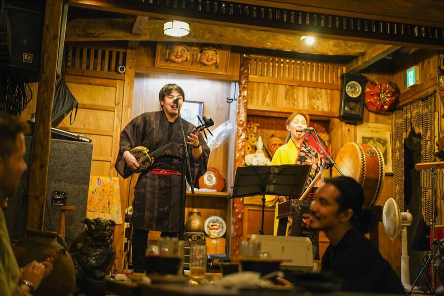 Naha Bar Hopping Tour in Okinawa - Stop three: Okinawan food with live music