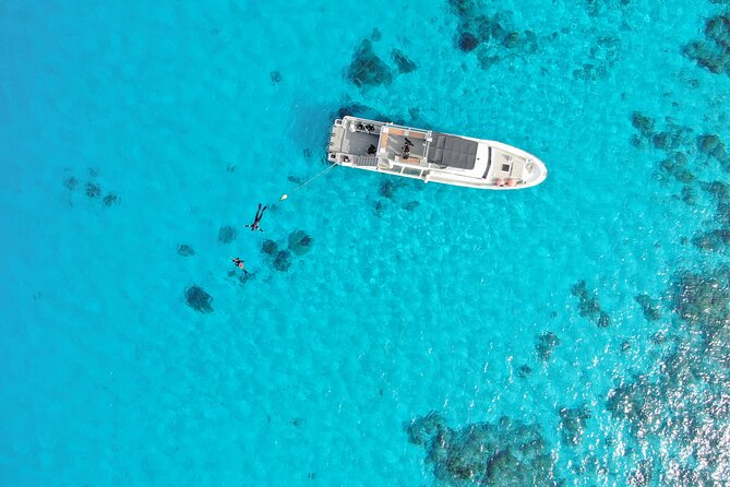 Naha: Full-Day Snorkeling Experience in the Kerama Islands, Okinawa - What the guides do in the water