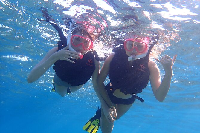 Okinawa Iriomote Snorkeling Tour at Coral Island - Getting ready for salt water and a boat ride
