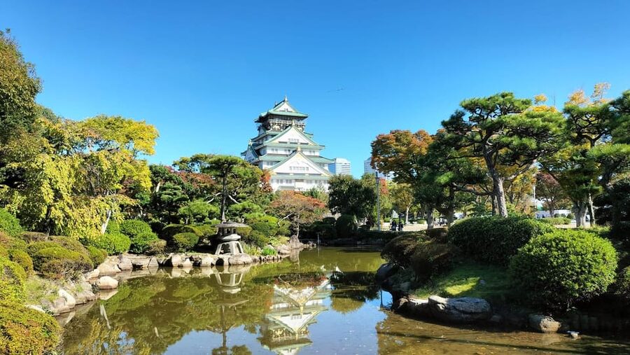 Osaka Castle Guided Tour - Walking the castle grounds and stone defenses