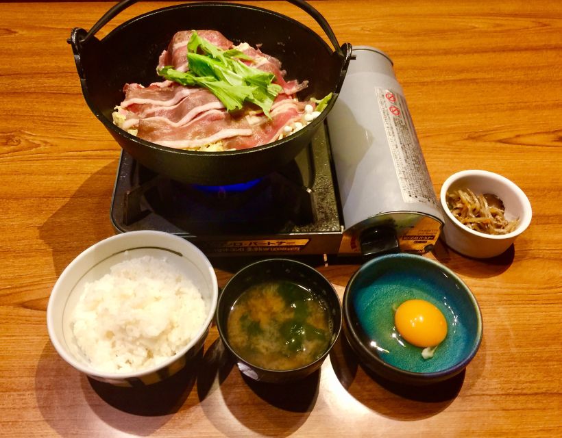 Osaka: Food Tour at Night with Tastings - The shrine and the older side of Dotonbori
