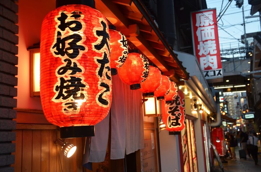 Osaka: Food Tour at Night with Tastings - Four food stops, from street snacks to Osaka specialties
