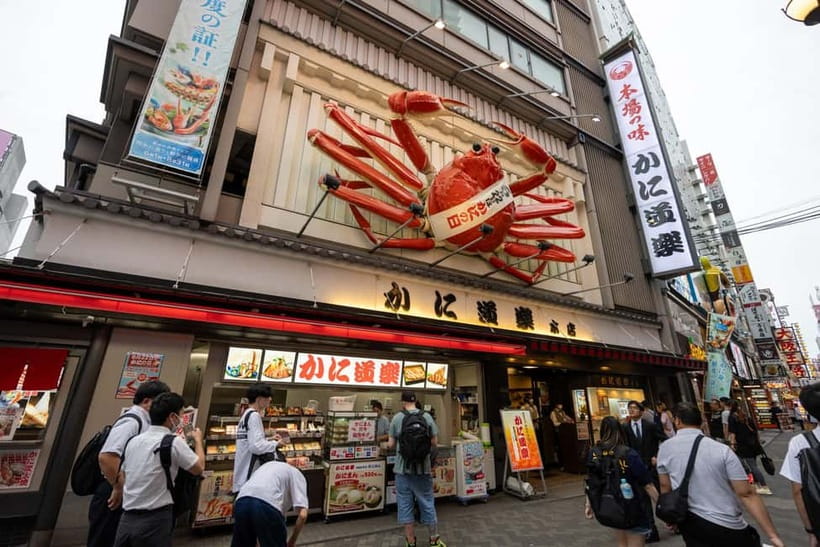 Osaka: Food Tour Kuromon Market & Dotonbori with Guide - Egg Tart for a sweet finish