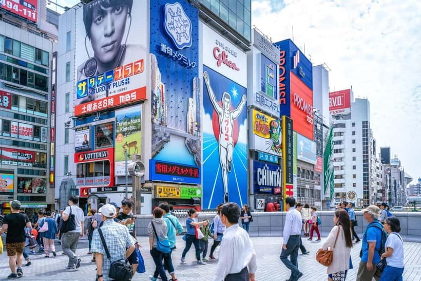 Osaka: Food Tour Kuromon Market & Dotonbori with Guide - The Glico sign at Ebisu Bridge