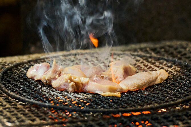 Osaka: Guided Food Tour with 12 Dishes at 4 Local Eateries - Grilled skewers and the izakaya rhythm