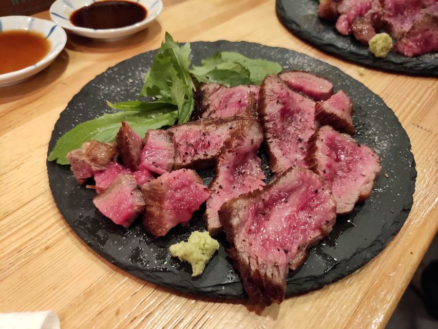 Osaka: Small Group, Big Flavors & Hidden Local Secrets Tour - First restaurant: local food with a drink