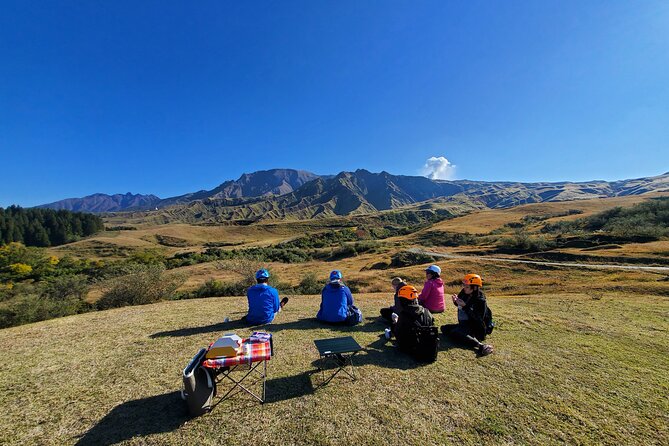 Private E-MTB guided cycling around Mt. Aso volcano & grasslands - The downhill return and the wide caldera view