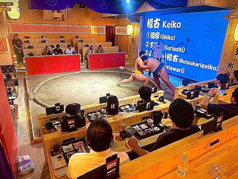 Sapporo: Sumo Show Experience with Japanese food & Photo - Learning the rules before the action