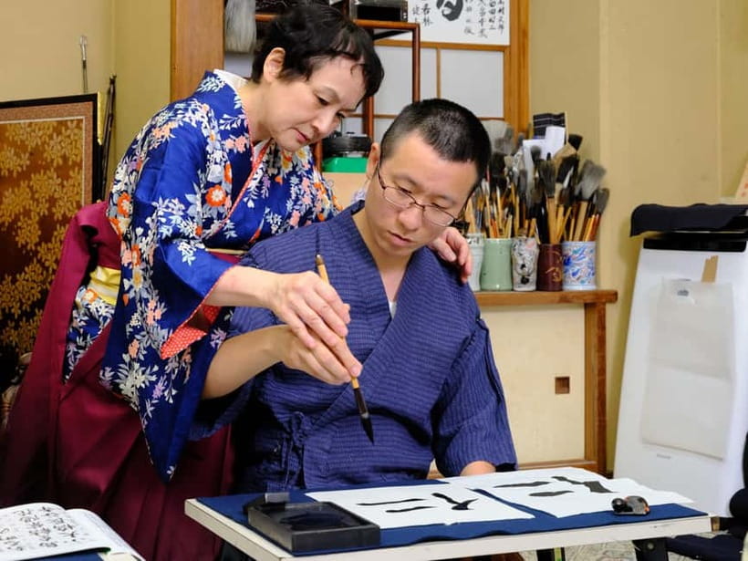 Tokyo: Calligraphy Experience with yukata or Samue - Creating the final artwork