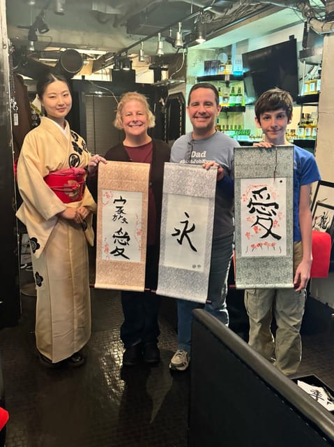 Tokyo: Calligraphy on Kanji Fan & Scroll with Drink - Choosing a kanji character with meaning