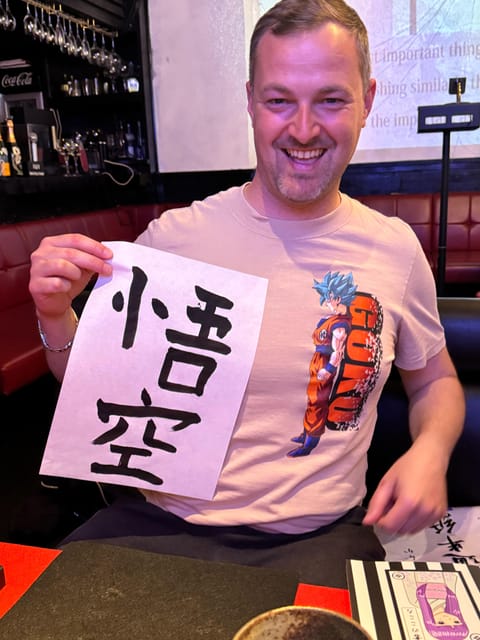 Tokyo: Calligraphy on Kanji Fan & Scroll with Drink - Painting the uchiwa fan and kakejiku scroll