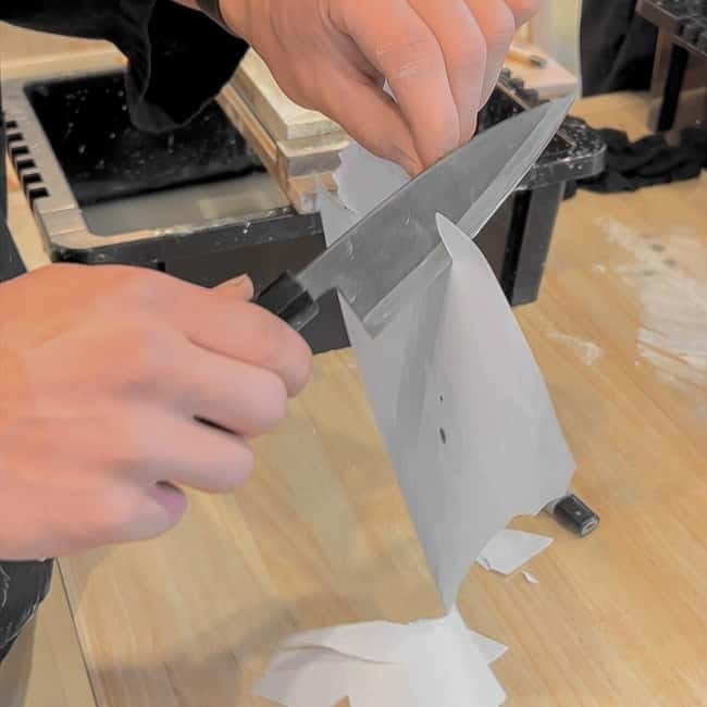 Tokyo: Knife Making Workshop (Sharpening, Engraving) - Arriving in a haori and getting ready to work