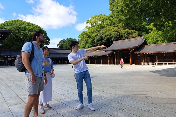 Tokyo: Meiji Shrine and Shinto Culture Walking Tour - The giant wooden torii at Meiji Jingu