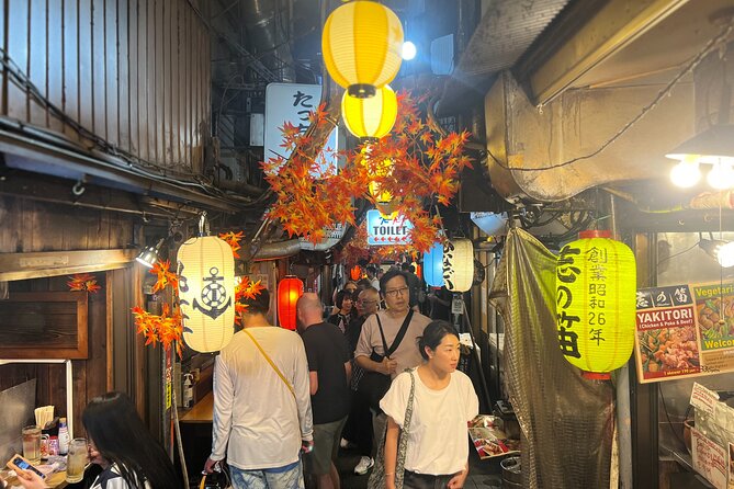 Tokyo: Shinjuku Food Tour (13 Dishes at 4 Local Eateries) - The guides shape the whole evening