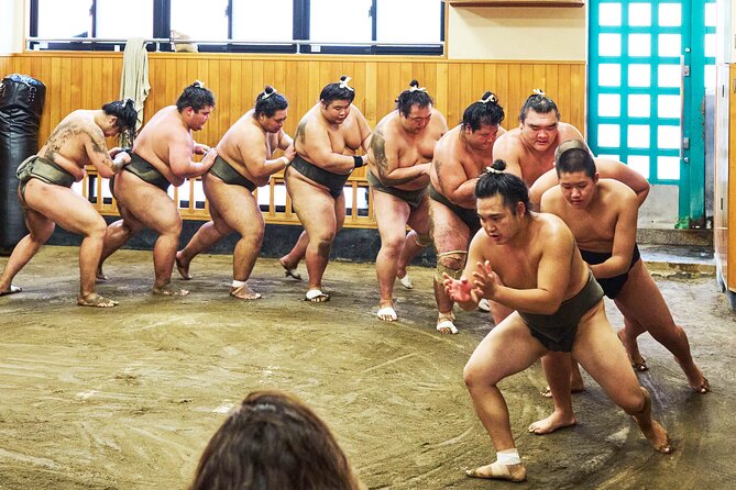 Tokyo: Sumo Morning Practice Viewing Tour at a Real Stable - The guide’s introduction makes the action easier to follow