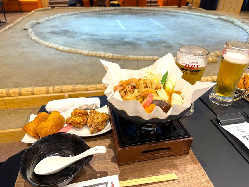 Tokyo: Sumo Show Experience with Chicken Hot Pot and a Photo - The main match: retired professionals put on a show