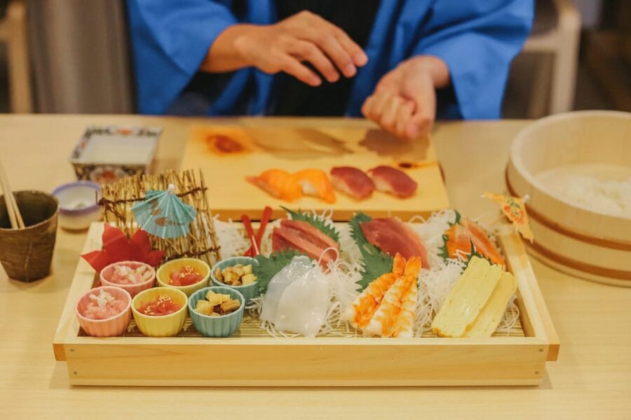 Tokyo: Sushi Making Class in a Happi Coat near a Famous Spot - Learning nigiri with tuna and salmon
