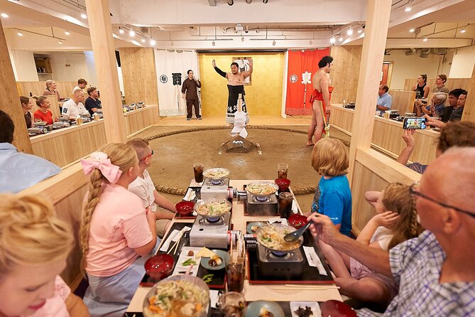 TokyoSumoShow, ChickenHotPot, and Mochi-Pounding by Pro Wrestlers - The ring entrance ceremony brings the room to attention