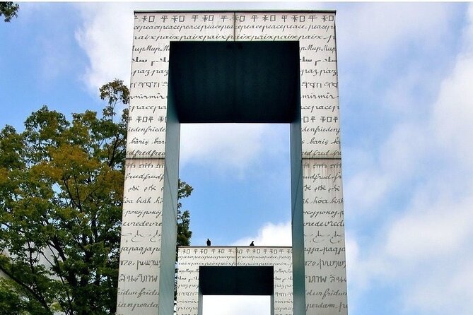 Walking Through History: Hiroshima's Path to Peace - The Peace Flame and the cenotaph